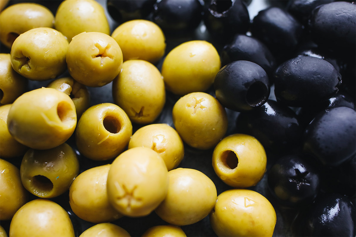 Close-up image of green and black olives | Girl Meets Food