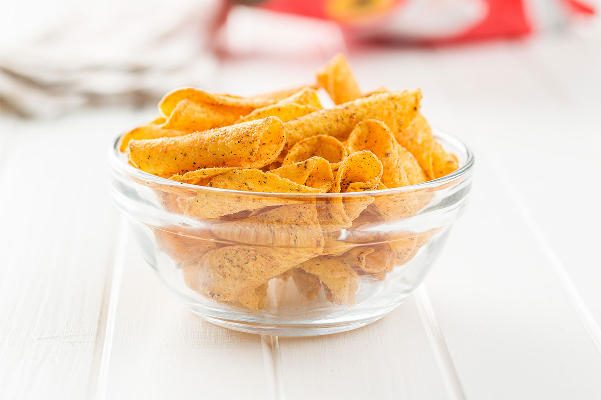 Takis chips in a transparent bowl | Girl Meets Food