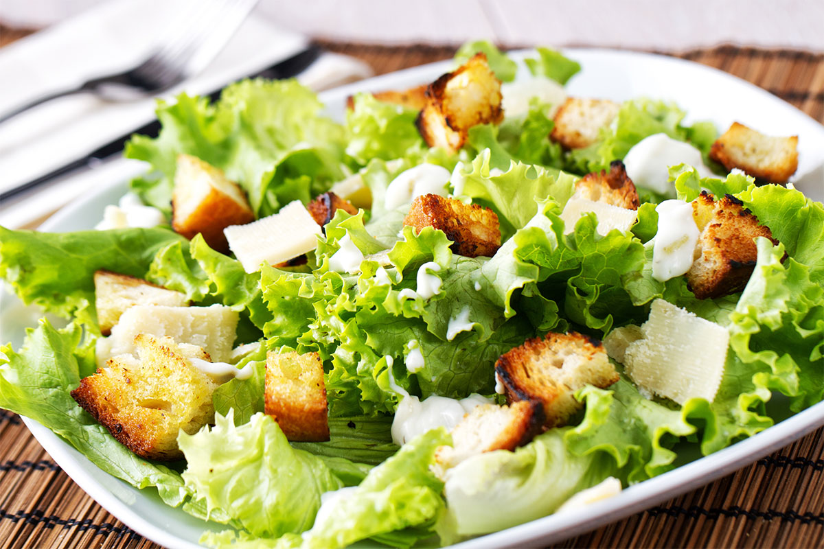 A plate of Caesar salad | Girl Meets Food