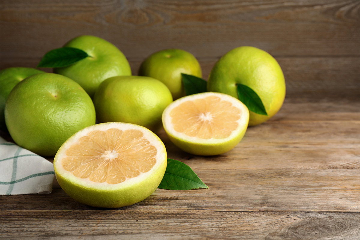 Oro blanco fruits on a wooden surface | Girl Meets Food