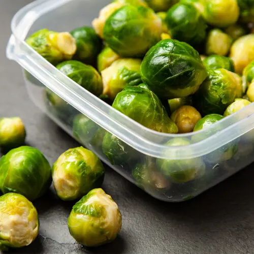 Fresh Brussels sprouts in plastic lunch box | Girl Meets Food