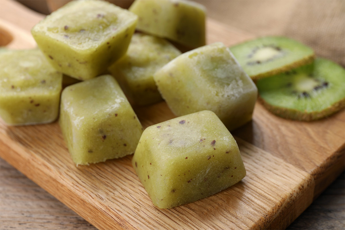 Frozen kiwi puree cubes on the cutting board | Girl Meets Food