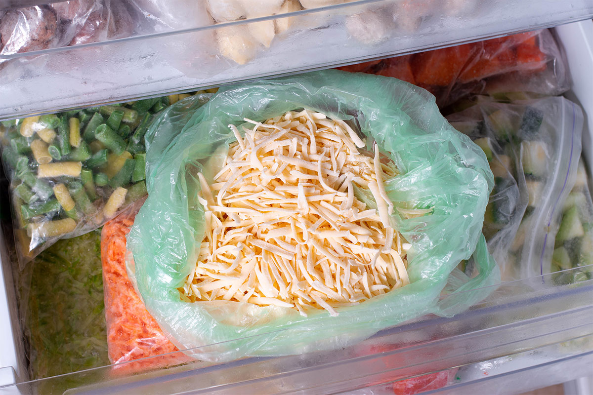 Frozen shredded cheese in plastic bag in the freezer | Girl Meets Food