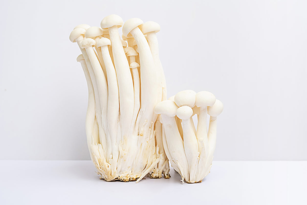 White beech mushrooms on white surface | Girl Meets Food