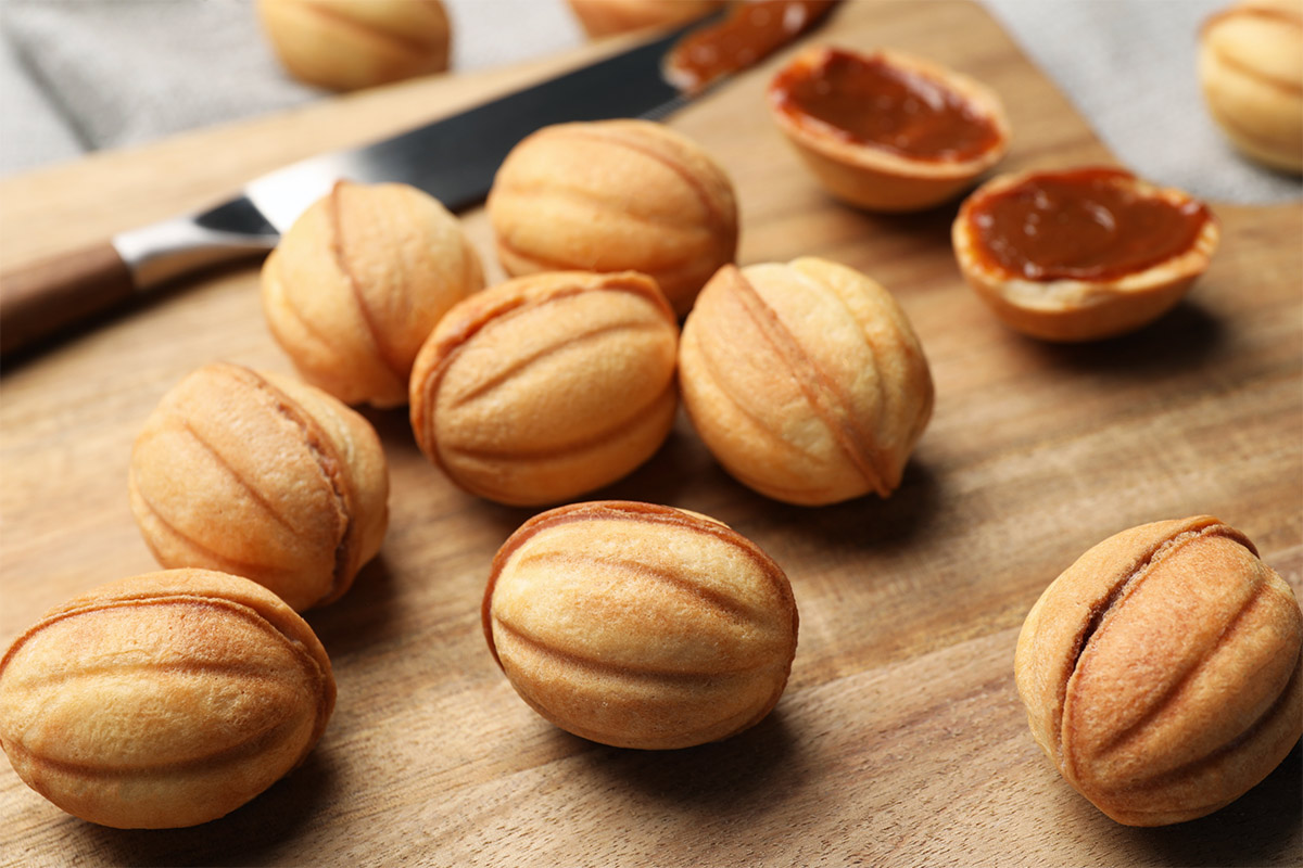 Horishky (walnut shaped cookies) on a cutting board | Girl Meets Food