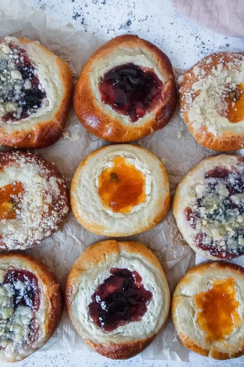 Kolaches on parchment paper | Girl Meets Food