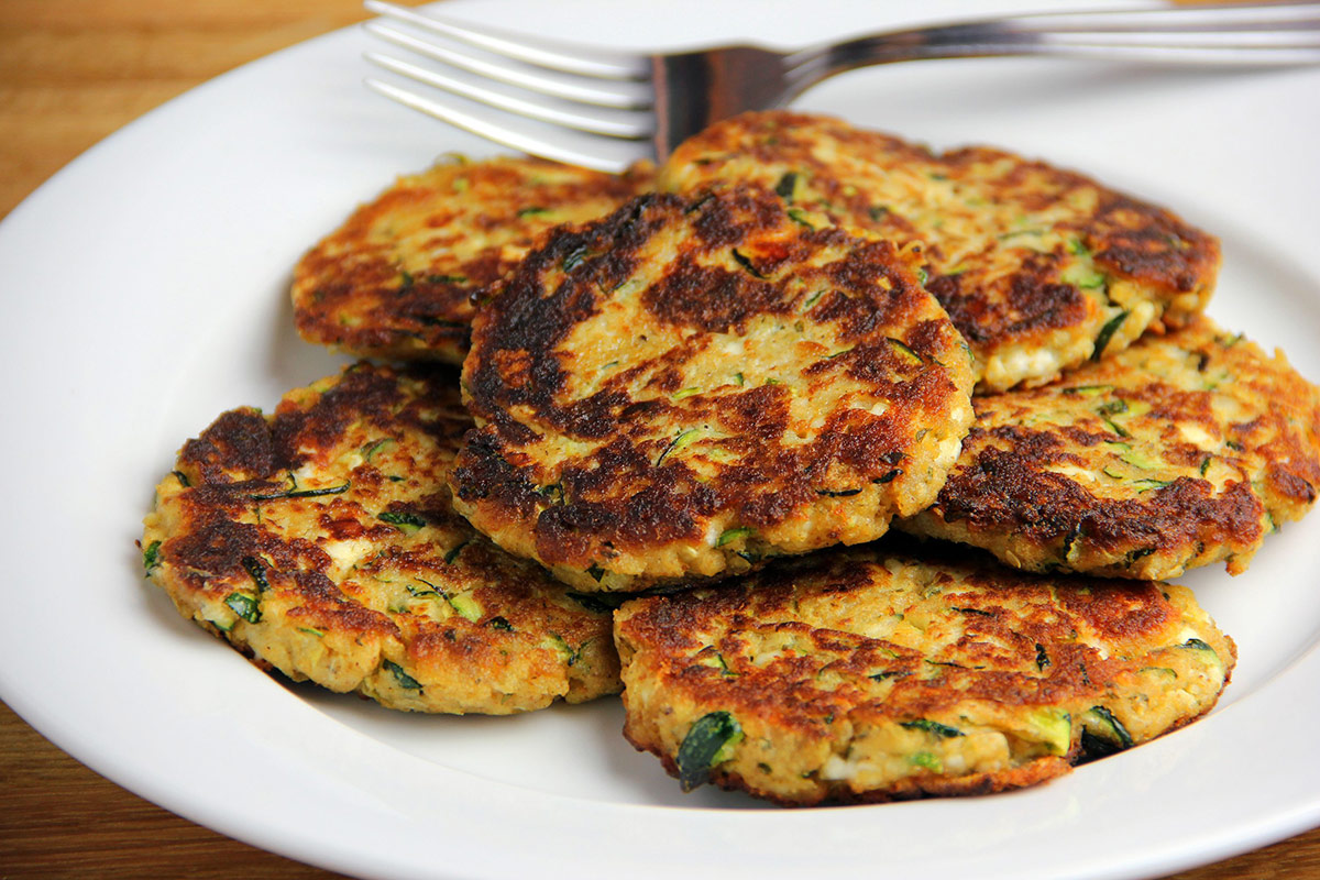 A plate of zucchini fritters | Girl Meets Food