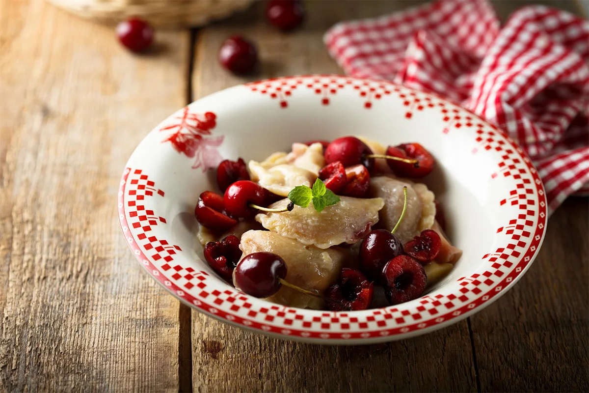 A bowl of cherry varenyky | Girl Meets Food