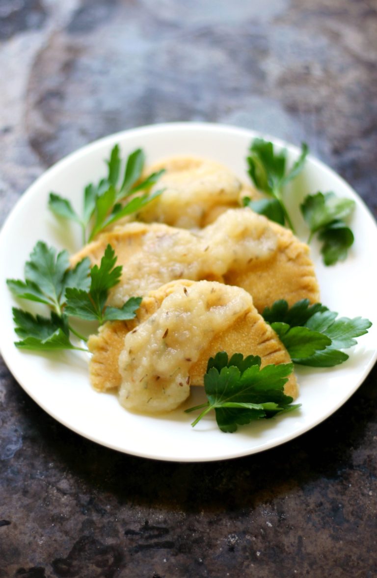 A plate of Chickpea Flour Pierogies with Spiced Applesauce | Girl Meets Food