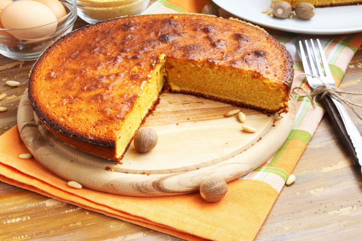 Zlevanka (Sweet Corn Pie) on a cutting board | Girl Meets Food