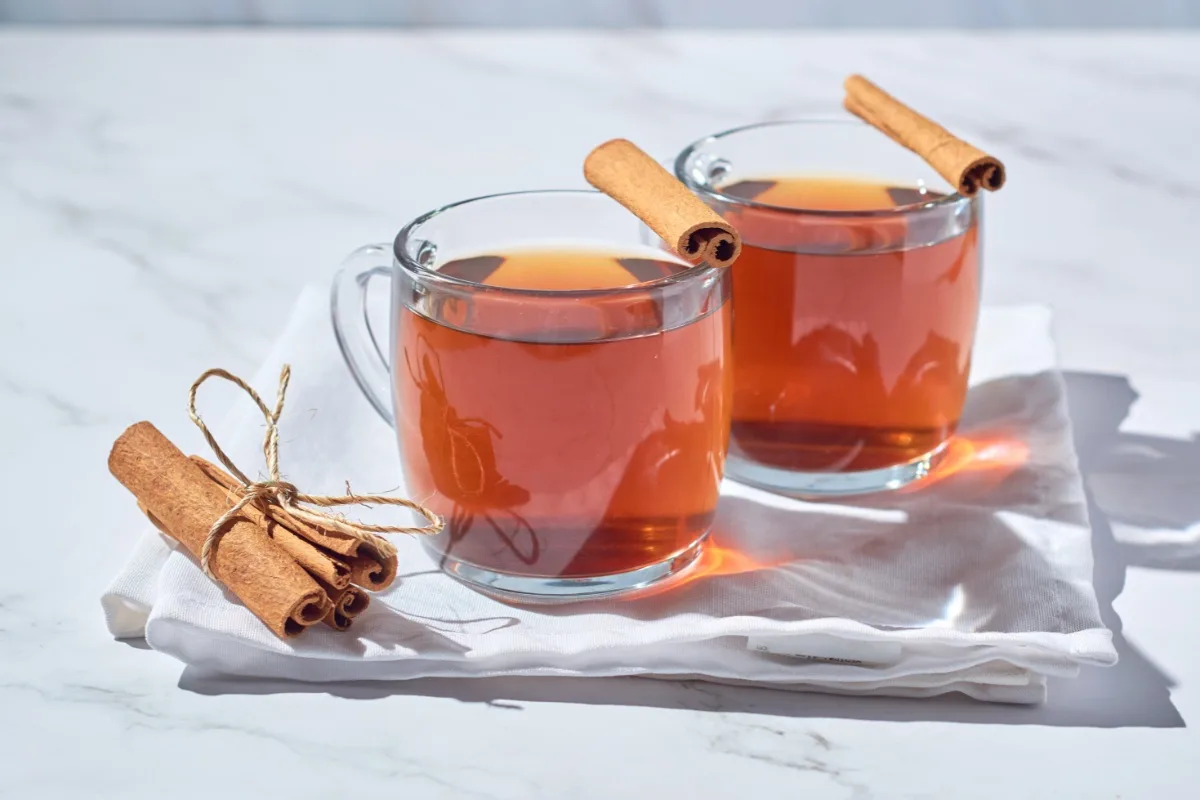 Two cups of Miod Pitny (Mead) with cinnamon sticks | Girl Meets Food