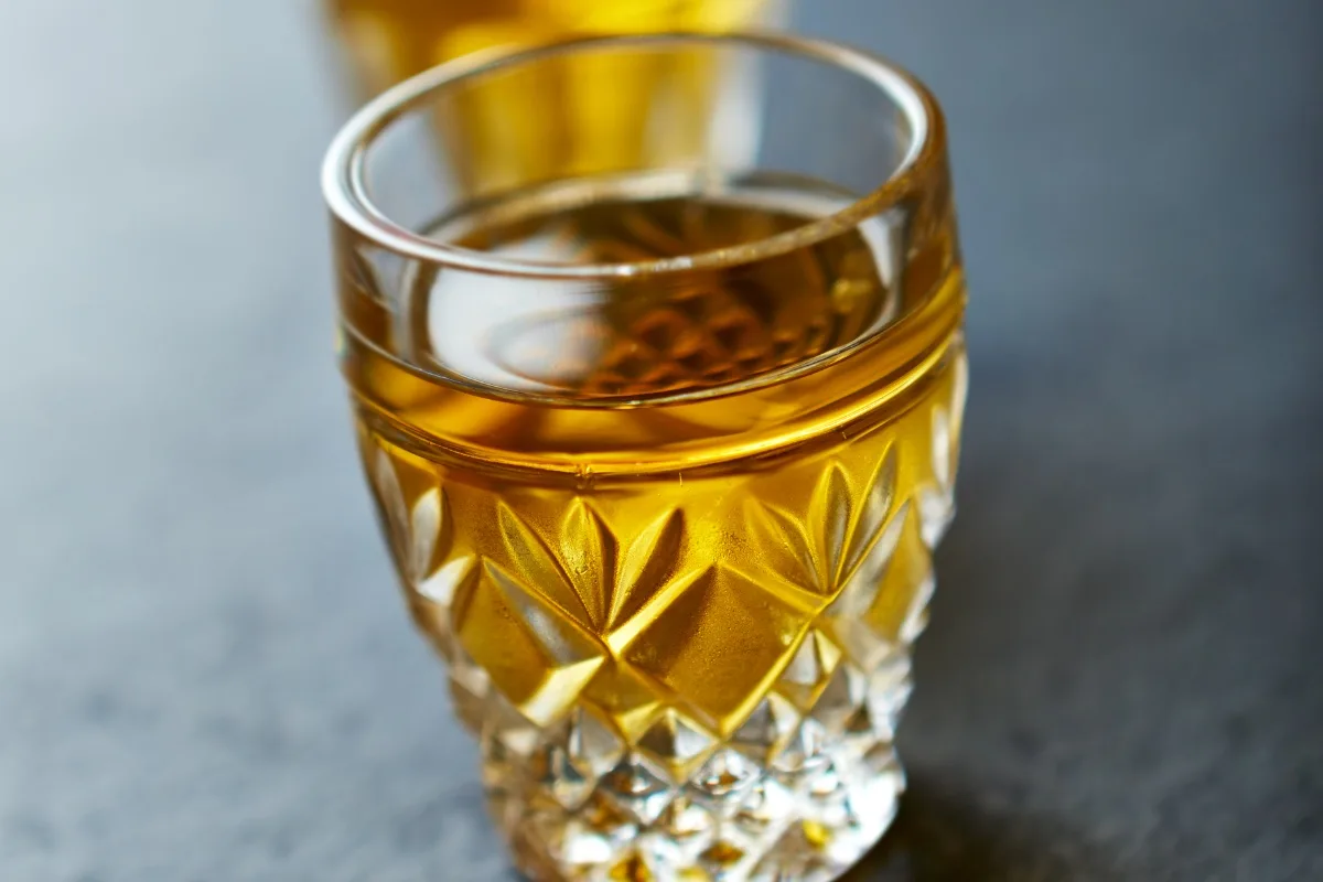 A glass of Żubrówka (bison grass vodka) | Girl Meets Food
