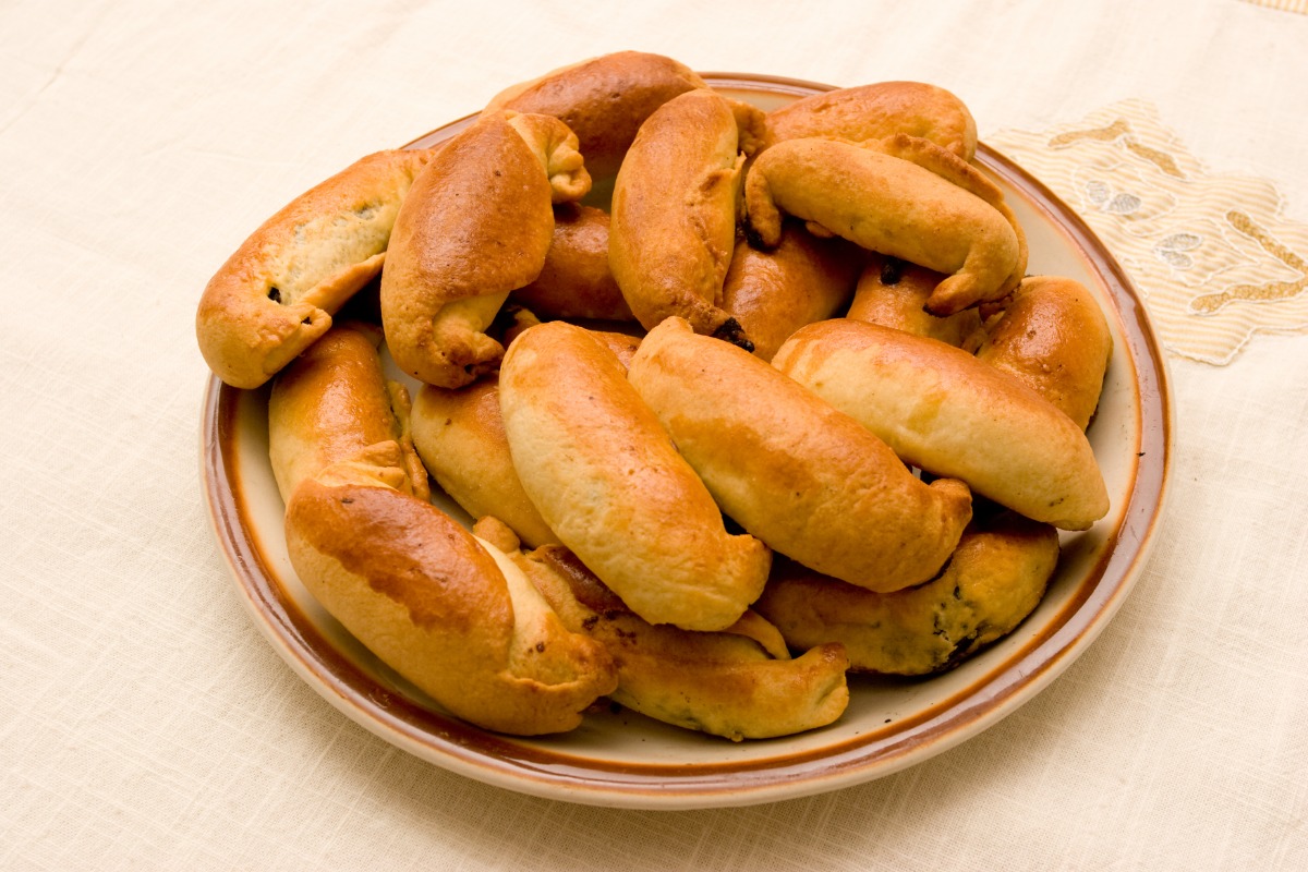 A plate of Bratislavské Rožky (Bratislava Rolls) on the table covered with a tablecloth | Girl Meets Food